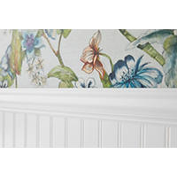 Thumbnail image of Focus on decorative wall tile on upper half of wall coupled with beadboard on lower half and transition trim.  