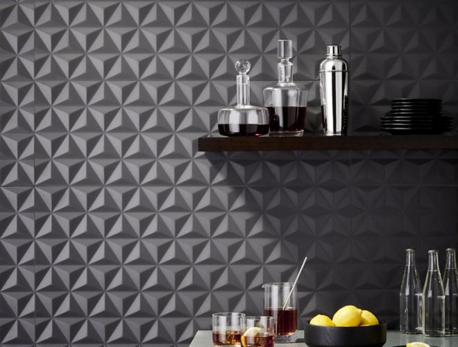 Contemporary bar with dark grey geometric 3-d tile.