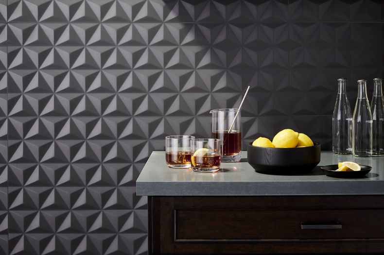 Contemporary bar with dark grey geometric 3-d tile.