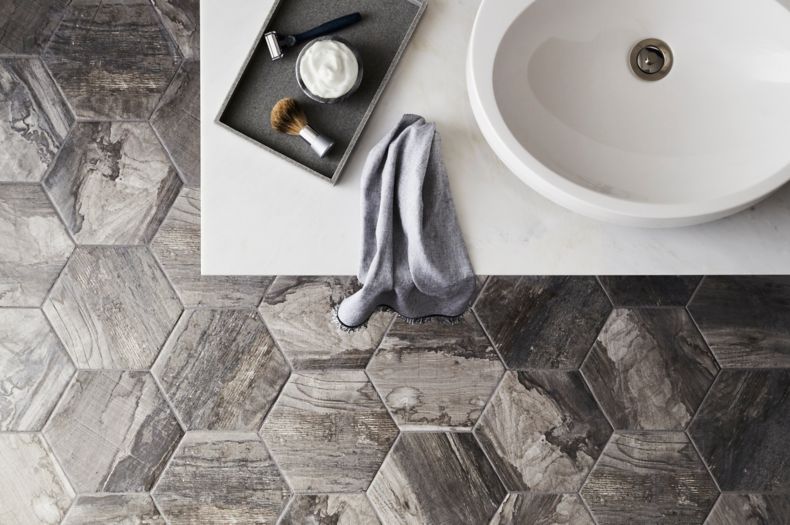 Rustic bathroom with wood look, hexagon floor tile.