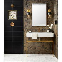 Thumbnail image of Bathroom area using several tiles from Florida walls. Flooring is a mosaic Carrera marble in Chevron pattern well while has both square ceramic and rectangular ceramic tiles with recessed shelf using natural stone and mirrored mosaic as decorative. Vanity wall features a textured golden black tile pattern and stack layout.