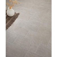 Thumbnail image of View of a floor shot from above using porcelain tile rectangular in shape with a matte finish and gray coloration.