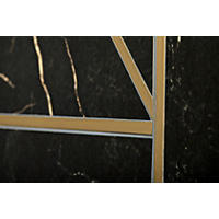 Thumbnail image of This detail view is a combination of porcelain tile with organic shapes and streaks in coordinating shades and tile trim pieces plated in 24-karat gold. 
