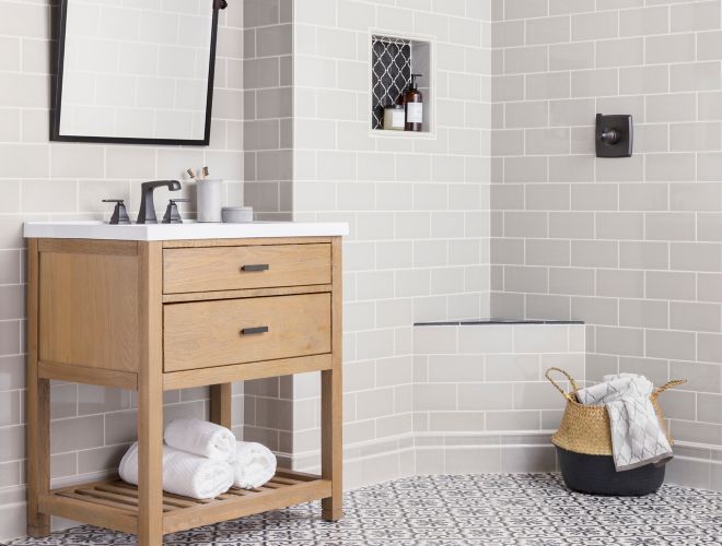 Grey ceramic subway tile bathroom wall patterned encaustic cement floor tile.