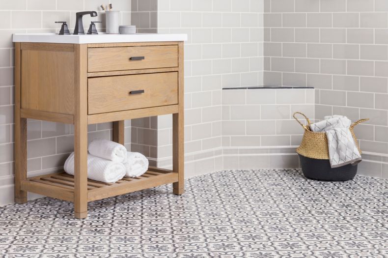 Grey ceramic subway tile bathroom wall patterned encaustic cement floor tile.