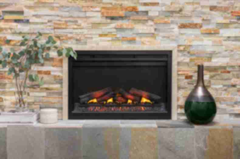 Fireplace with multi-color architectural quartzite tile.