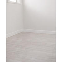 Thumbnail image of Small space with a wood look ceramic tile staggered on the floor.  Tones are of a natural light wood in soft creams and beiges.
