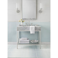 Thumbnail image of Bathroom area focused on vanity area with tiled walls and floor.  Soft blue whits and greys are used in both ceramic and marble alike. 
