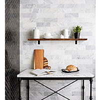 Thumbnail image of Kitchen area with counter to work and tiled walls to impress.  Made of natural stone this black ,white and ivory stone is both stunning and timeless.
