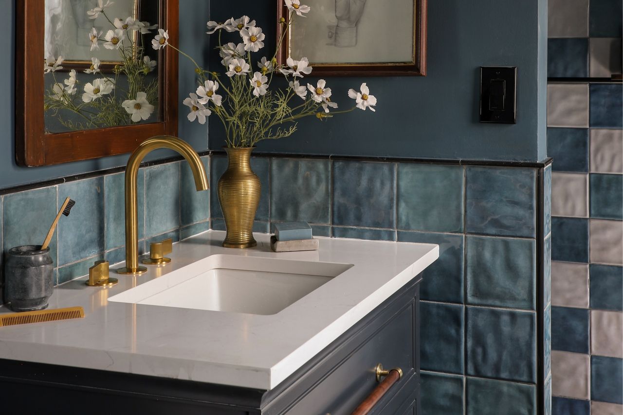 A brilliant blue bathroom featuring handmade-look blue square tile.