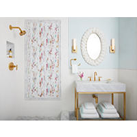 Thumbnail image of Bathroom area with walk in shower and floating vanity.  Shower and wainscoting is a ivory subway tile. Shower wall has a framed out glass tile and accented niche.