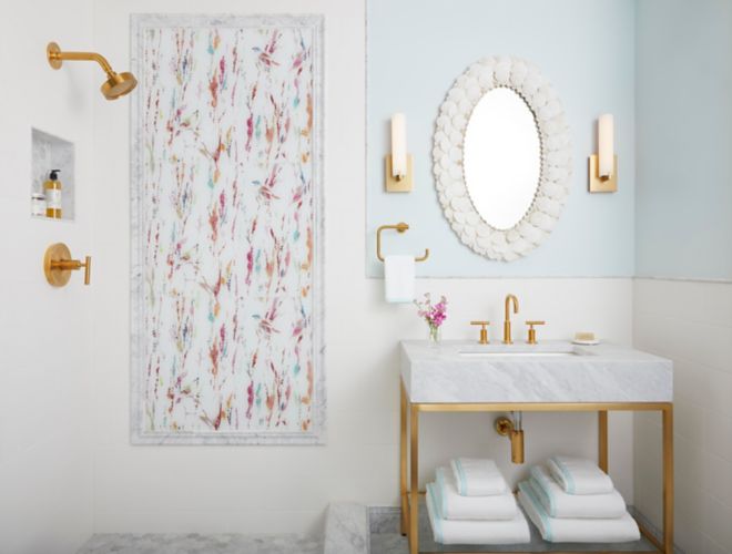 Pink and blue patterned glass tile bathroom.