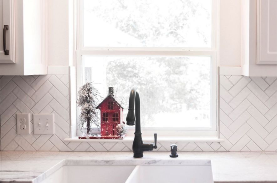 kitchen marble tiles surrounded the sink. 