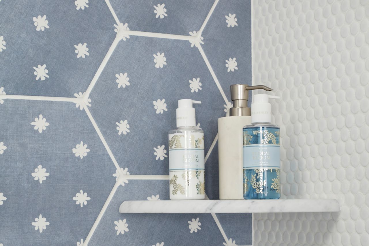 Detail of corner shelves, blue hexagon tile, and penny tile