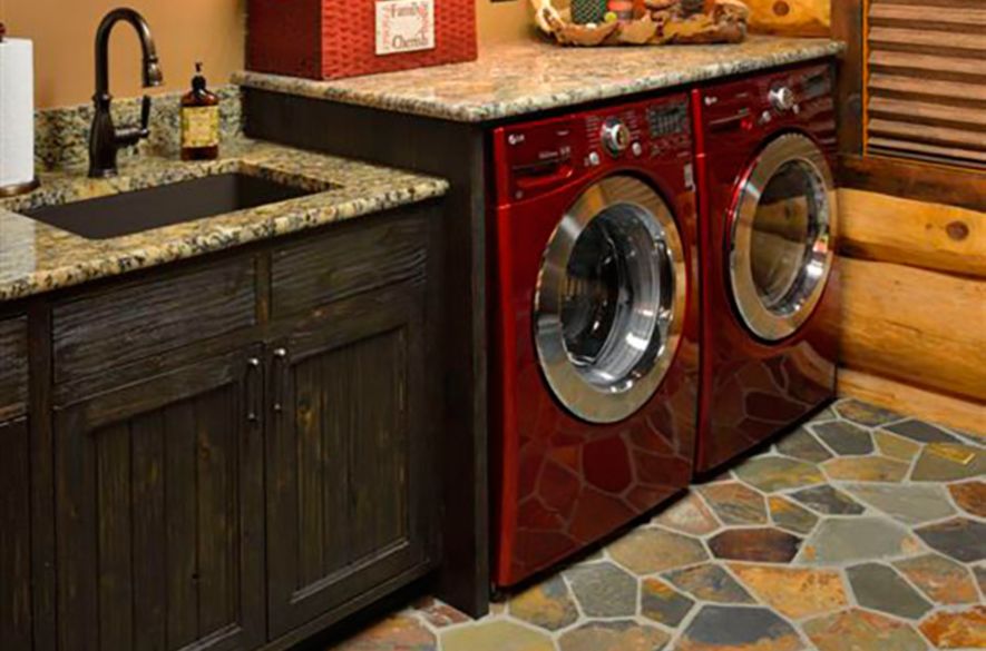 stone tiles in laundry room.