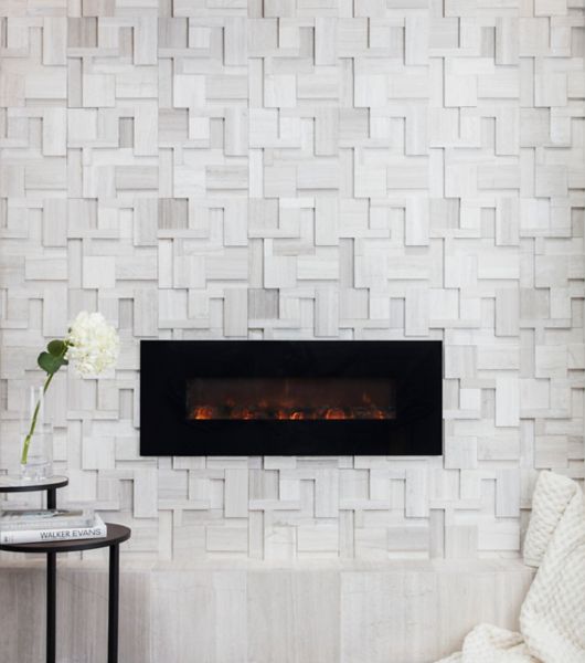 Sculptural limestone fireplace.