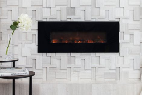 Sculptural limestone fireplace.