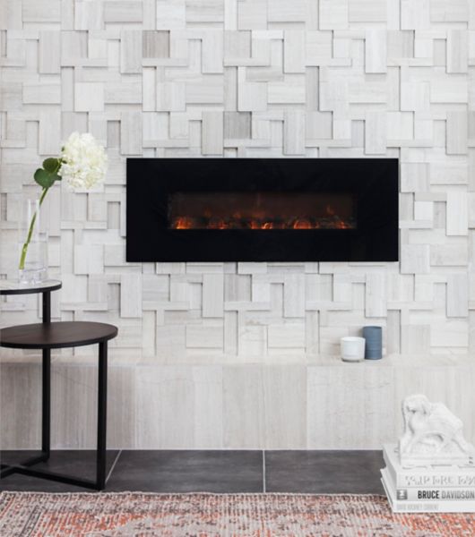 Sculptural limestone fireplace.