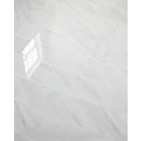 Thumbnail image of Floor tile offers the luxurious appearance of marble, in a polished finish with grey, black and white tones.
