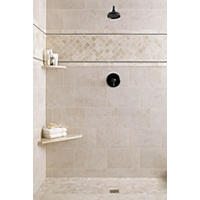 Thumbnail image of Shower with natural marble mosaics and accessories including corner seat and shelf.  Metal and natural stone profiles frame marble mosaic.  Tile in neutral beige and ivory tones.