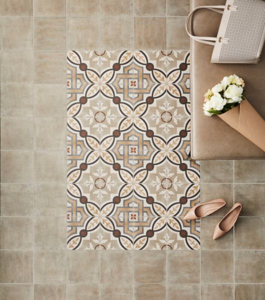 Brown and Tan Patterned Tile Entryway. 