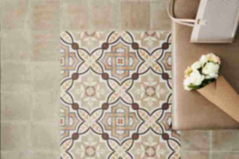 Brown and Tan Patterned Tile Entryway. 