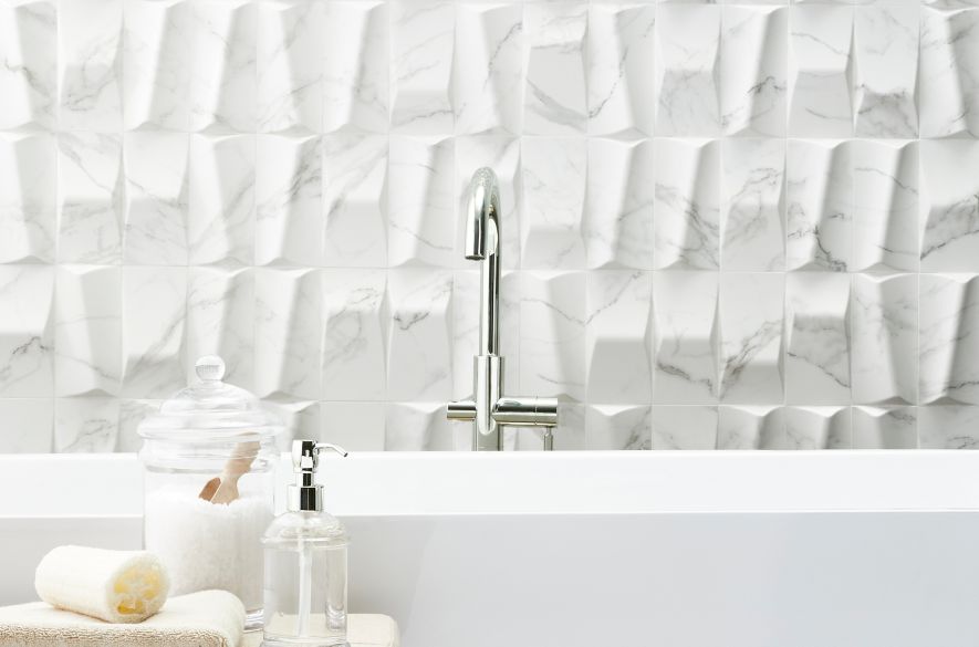 Sculptural white ceramic bathroom tile.