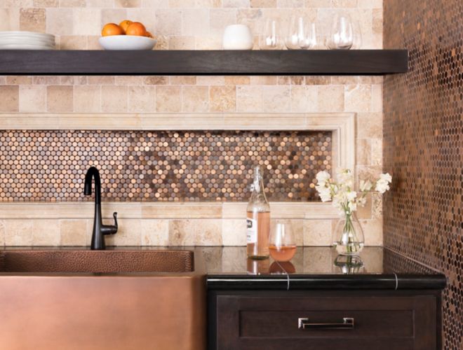 Kitchen backsplash with copper metallic tile.