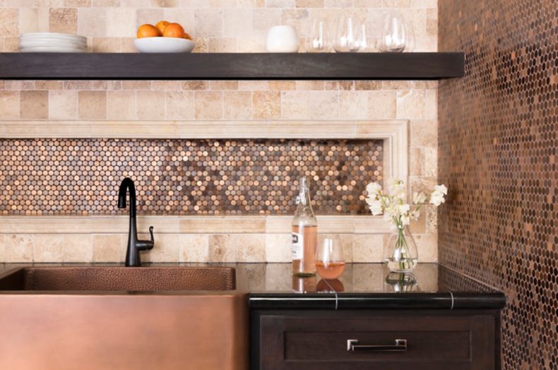 Kitchen backsplash with copper metallic tile.