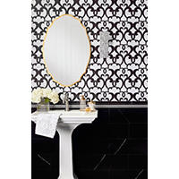 Thumbnail image of Bathroom vanity wall tiled in a black and white combination of natural marble mosaics, profiles and larger field tile to the complete the look.  Pedestal sink and mirror add to the French transitional design with metal tones.