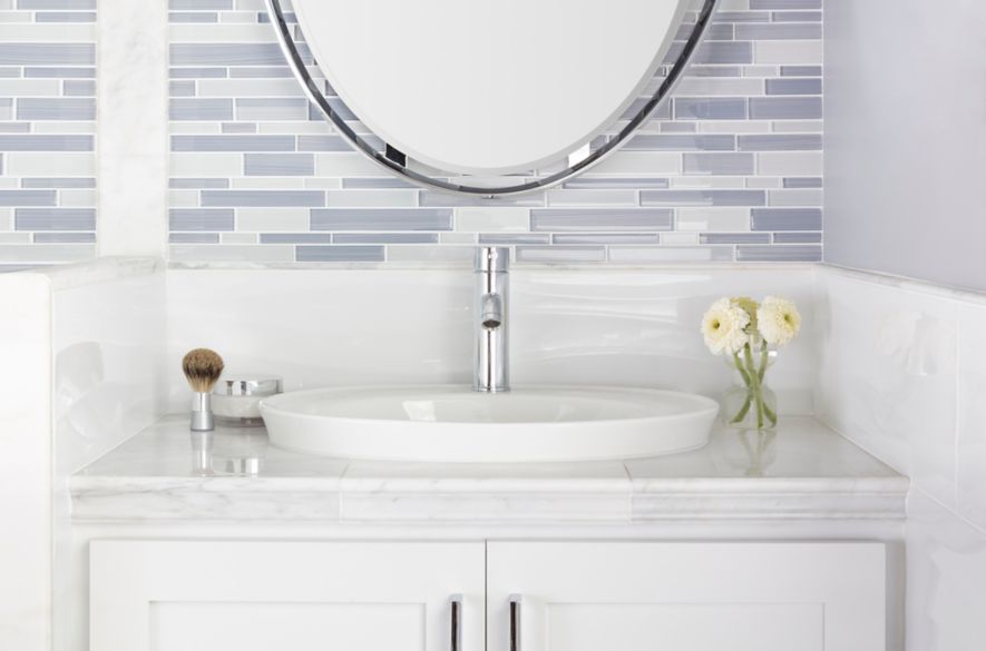 white marble tiles bathroom wash basin.