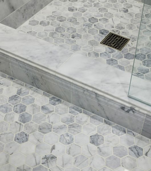 White and grey marble hexagon shower floor tile