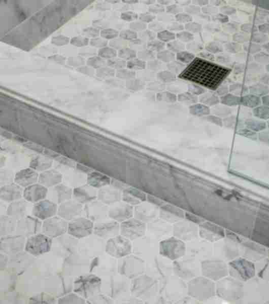 White and grey marble hexagon shower floor tile