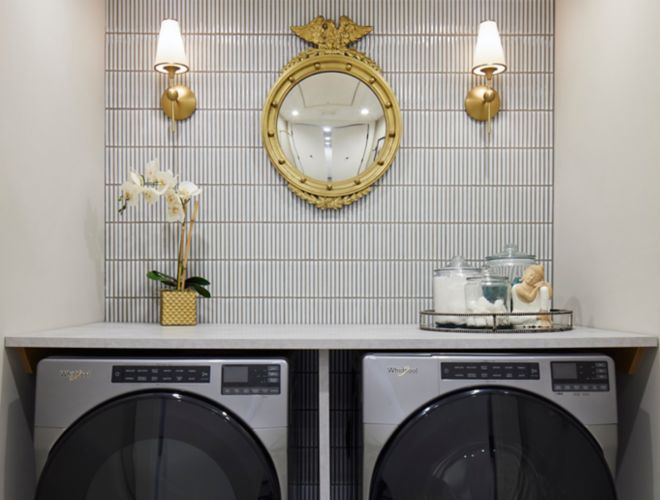 A laundry room featuring small white kit-kat shaped mosaic tile.
