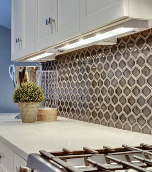 Kitchen backsplash with hexagon tile.