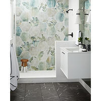 Thumbnail image of Bathroom with wall in shower with a combination of white marble, patterned porcelain, Black stone porcelain chevron, and glass and marble profiles.
