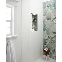 Thumbnail image of Bathroom shower area with White marble, hex leaf pattern, and decoritve niche with marble and glass profiles.