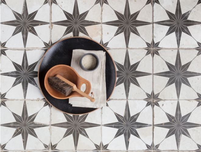 Black and white star encaustic floor tile.