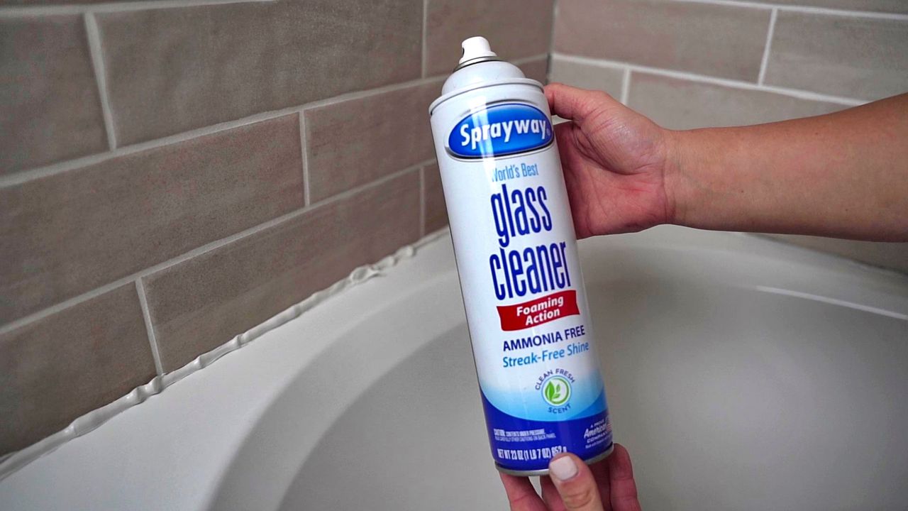Ammonia-free glass cleaner helps stop silicone caulk from sticking to nearby tub surfaces.