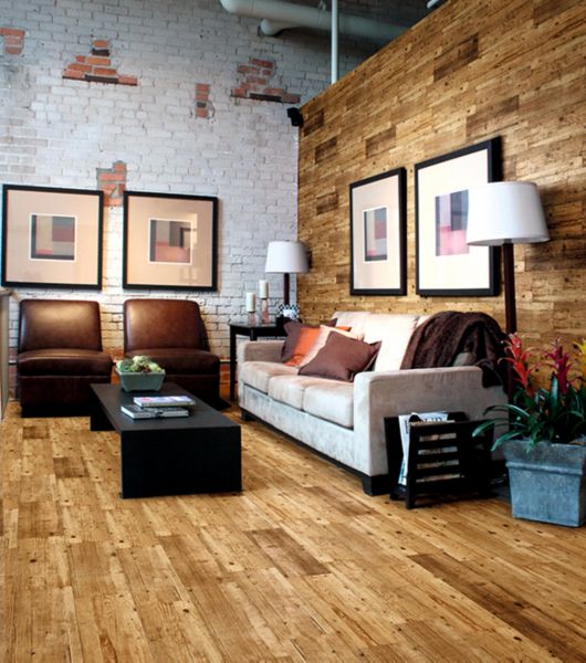 Industrial loft with wood-look tile and brick.