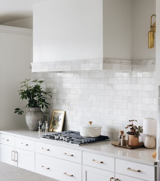 White marble subway tile kitchen backsplash.