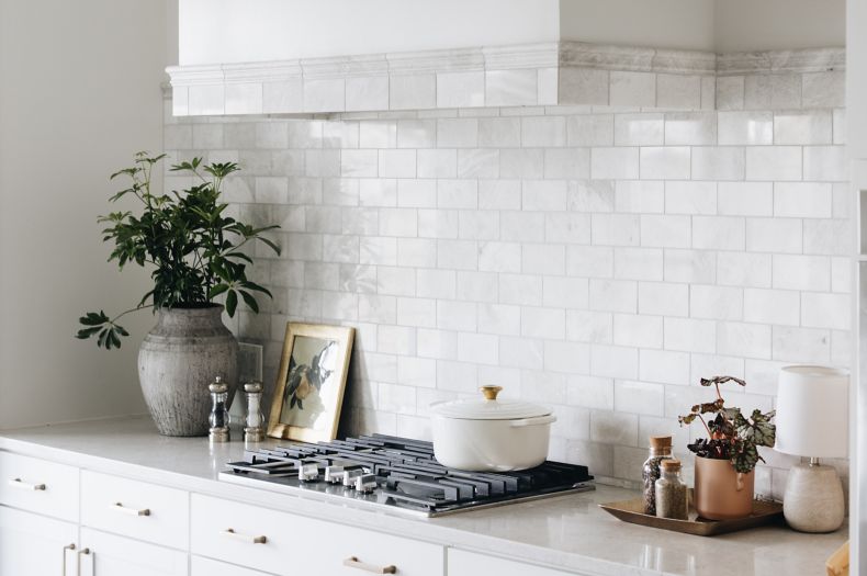 White marble subway tile kitchen backsplash.