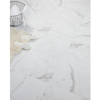 Thumbnail image of Bathroom floor with matte ceramic marble look tile in earth tones