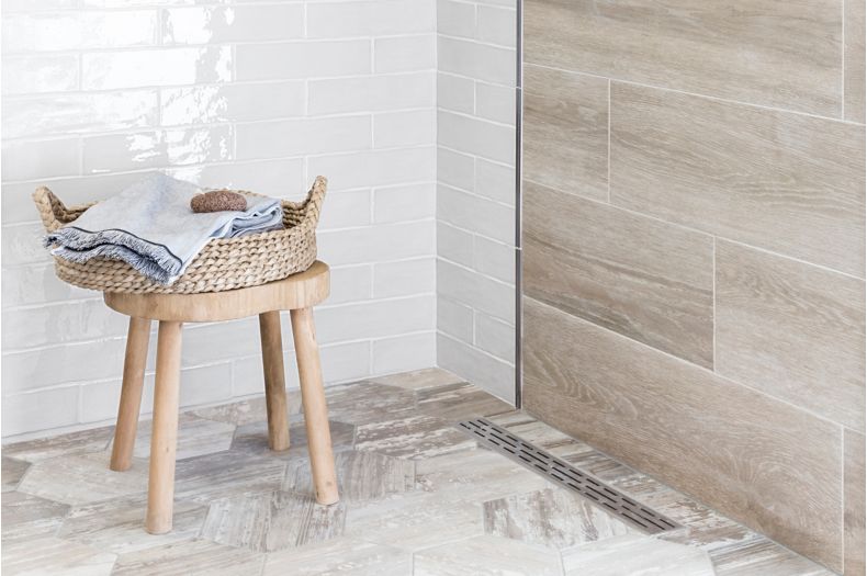 Shower with wood look tile.