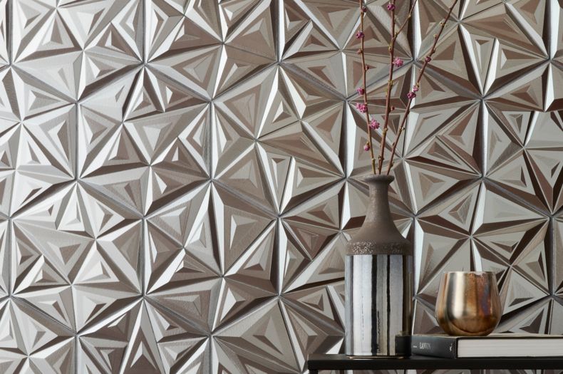 Metallic silver, 3-D geometric wall tile in contemporary entry way. 