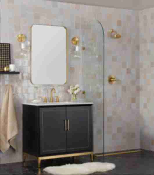 Bathroom shower and sink vanity with wall tiled in cream-colored tile