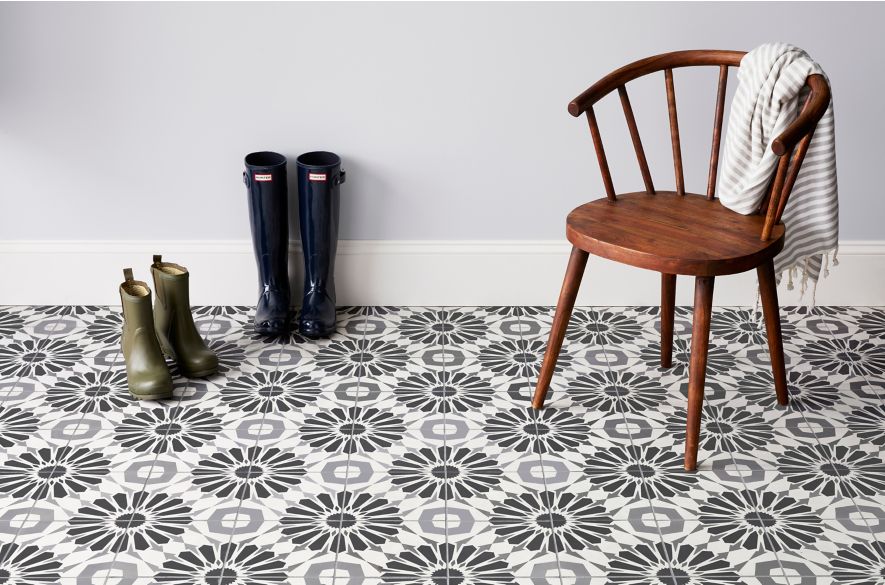 Encaustic patterned entryway floor.