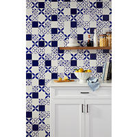 Thumbnail image of Mediterranean kitchen with blue and white patterned wall tile.