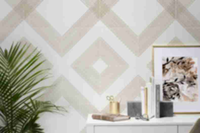 White and gold ceramic diamond pattern wall tile in a contemporary home office.