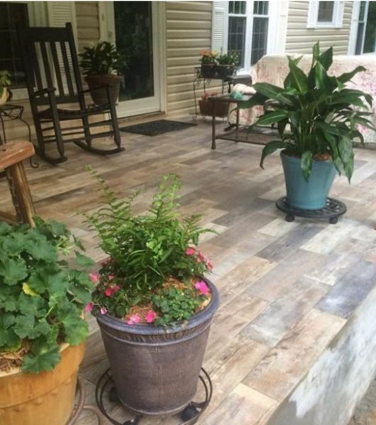 Patio with wood-look plank tile.